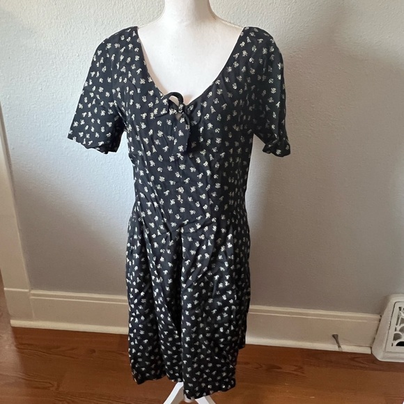 bobbie b designs Pants - Bobbie B Designs Black Short Sleeve Romper with Small Cream Flowers w Tie